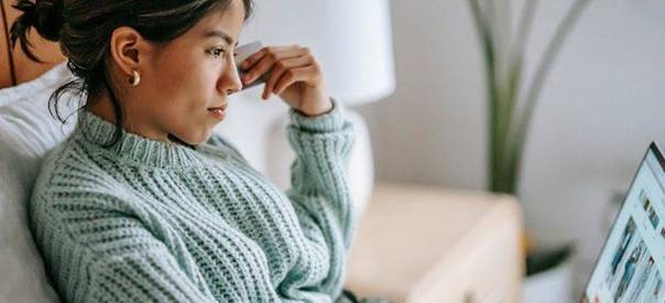 a woman contemplating therapy