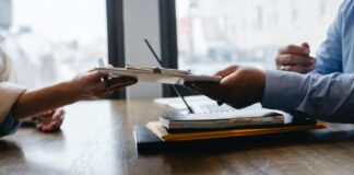 Why do HR workers in Australia carry out employment screening checks